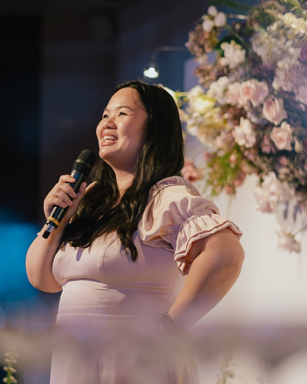 DJ Cinnaminh Minh Nguyen emceeing a wedding reception